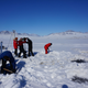 Photo of scientists working on frozen Arctic lake